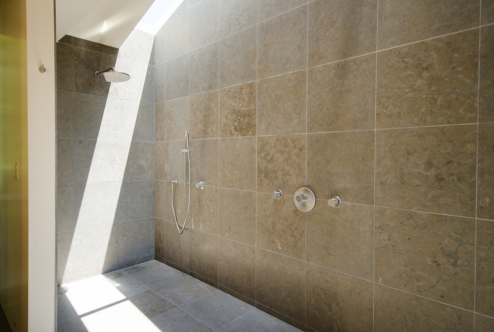 Inspiration for a contemporary ensuite bathroom in San Francisco with brown tiles, stone tiles, white walls, an alcove shower and travertine flooring.