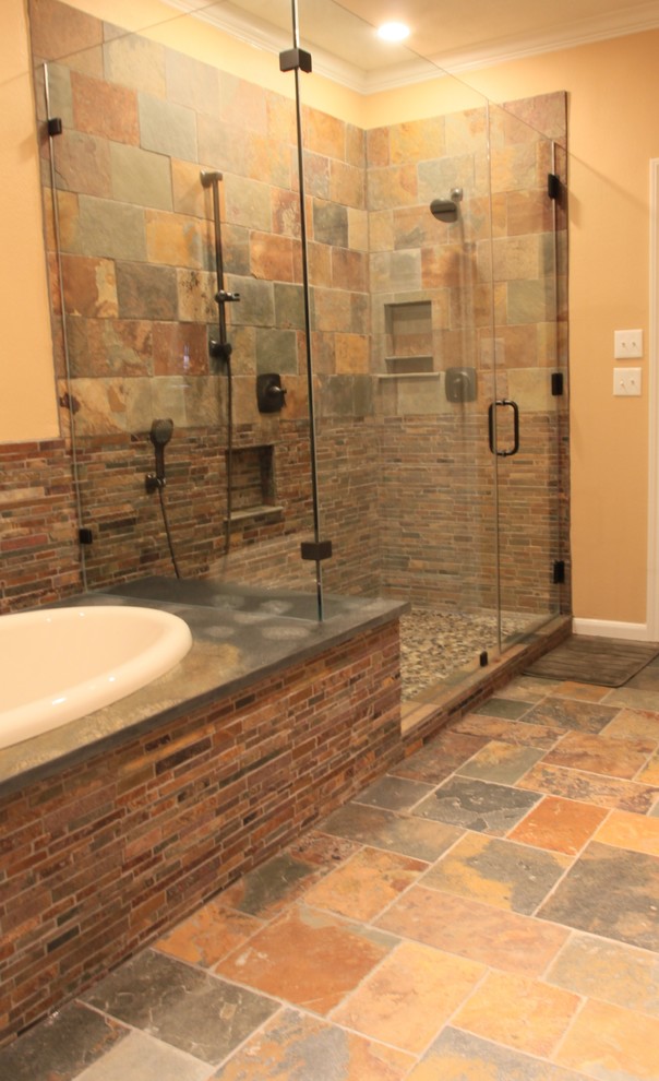 Inspiration for a mid-sized timeless master multicolored tile and stone tile slate floor bathroom remodel in Houston with yellow walls