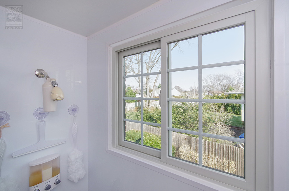 Sliding Window with Grilles in White Bathroom - Bathroom - New York