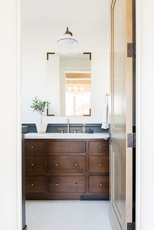 Example of a mid-sized transitional ceramic tile and white floor bathroom design in Salt Lake City with dark wood cabinets, white walls, marble countertops and multicolored countertops