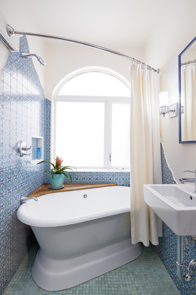 Inspiration for a small mediterranean master ceramic tile and blue tile mosaic tile floor and turquoise floor bathroom remodel in San Francisco with white walls, a wall-mount sink and white countertops