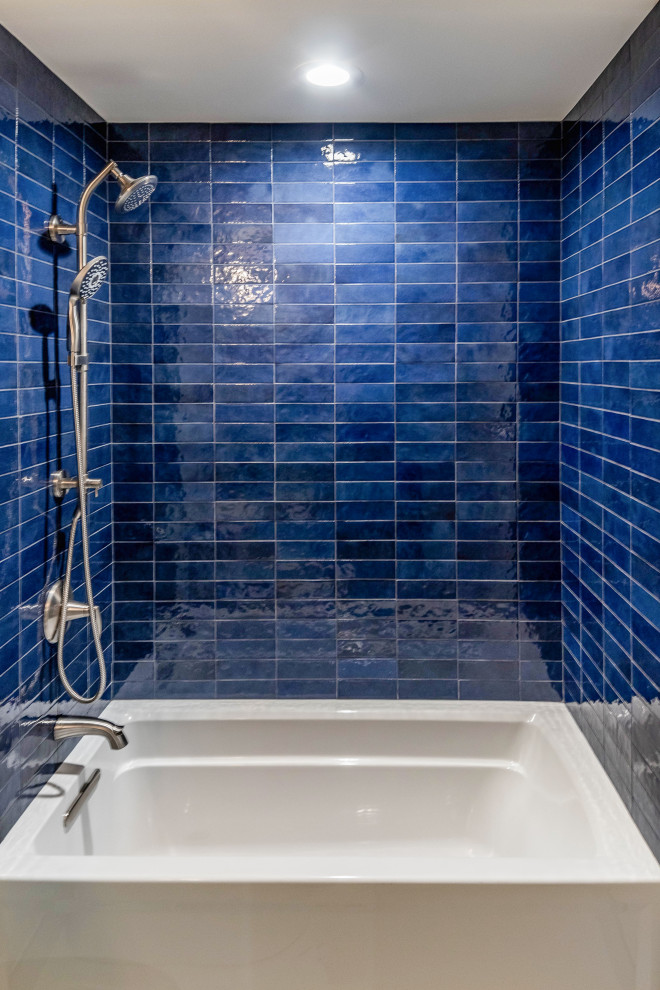 Inspiration for a small transitional blue tile and porcelain tile ceramic tile, gray floor and single-sink bathroom remodel in Seattle with flat-panel cabinets, white cabinets, a one-piece toilet, white walls, an undermount sink, quartzite countertops, gray countertops and a freestanding vanity