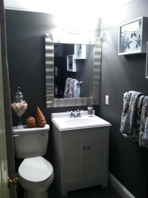 Example of an island style bathroom design in Orange County