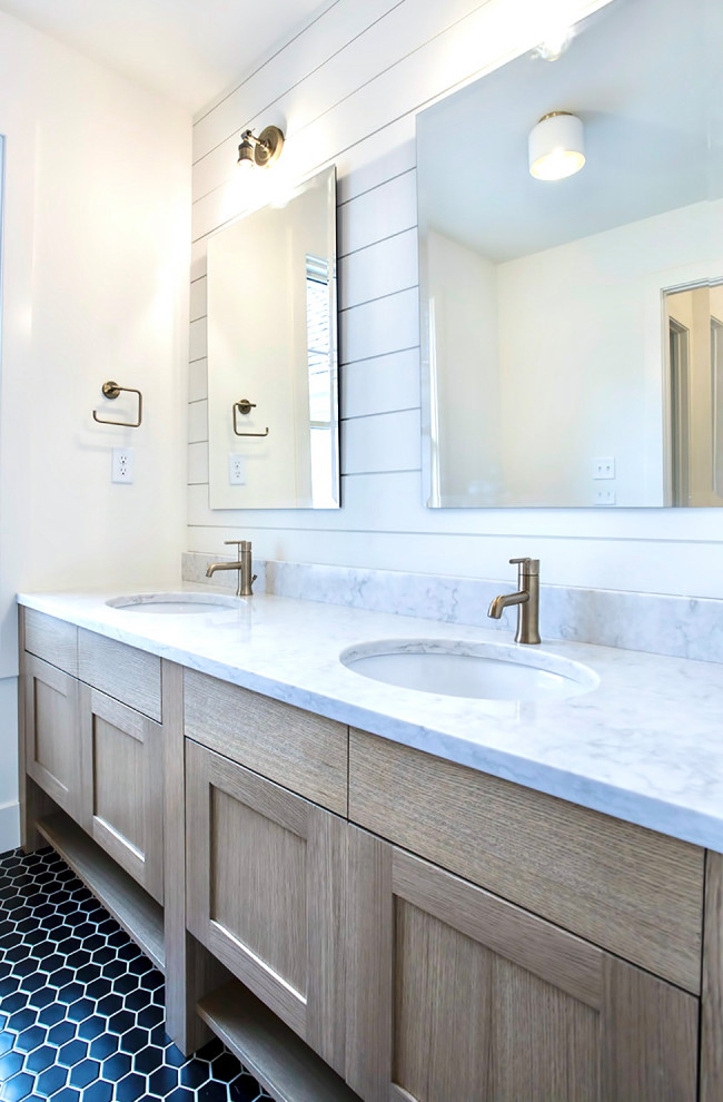 This is an example of a medium sized country family bathroom in Chicago with shaker cabinets, light wood cabinets, white walls, mosaic tile flooring, a submerged sink, marble worktops, black floors, white worktops, double sinks, a freestanding vanity unit and tongue and groove walls.