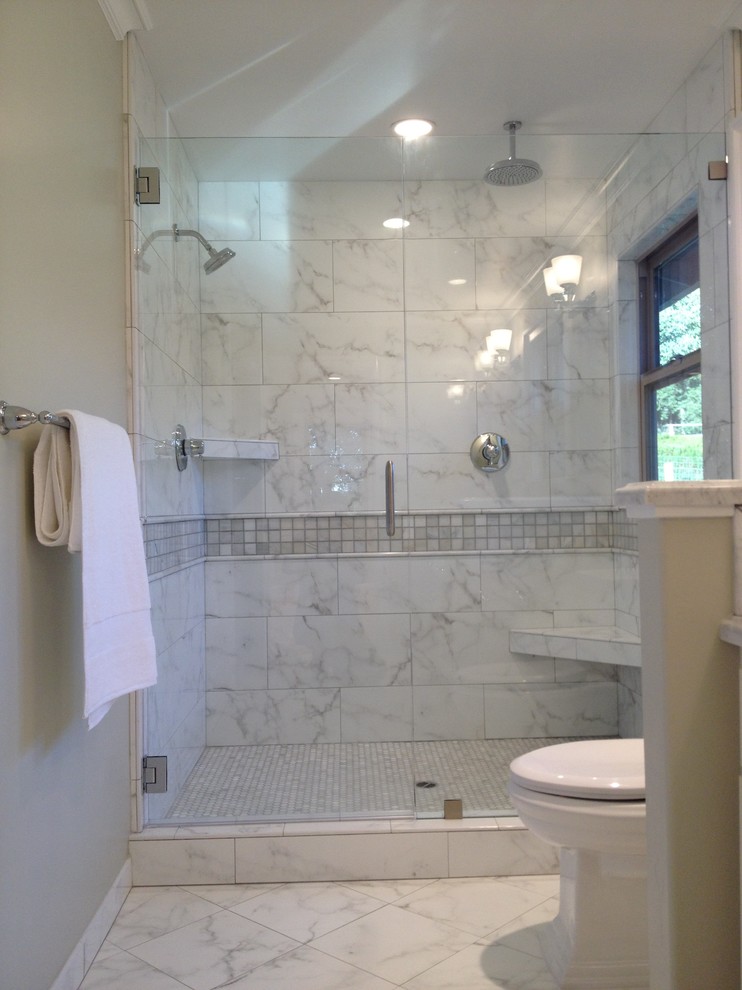 Example of a mid-sized classic 3/4 beige tile and ceramic tile marble floor and white floor alcove shower design in San Francisco with raised-panel cabinets, white cabinets, a two-piece toilet, beige walls, a drop-in sink, marble countertops and a hinged shower door