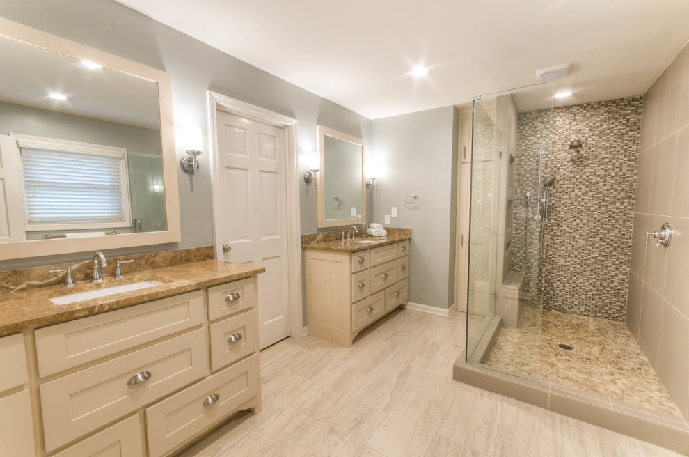 Inspiration for a mid-sized cottage master gray tile and porcelain tile porcelain tile doorless shower remodel in Atlanta with shaker cabinets, beige cabinets, gray walls, an undermount sink and granite countertops