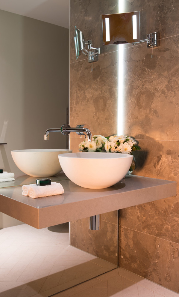 Example of a large trendy master brown tile and porcelain tile porcelain tile bathroom design in Brisbane with a vessel sink, open cabinets, granite countertops and white walls