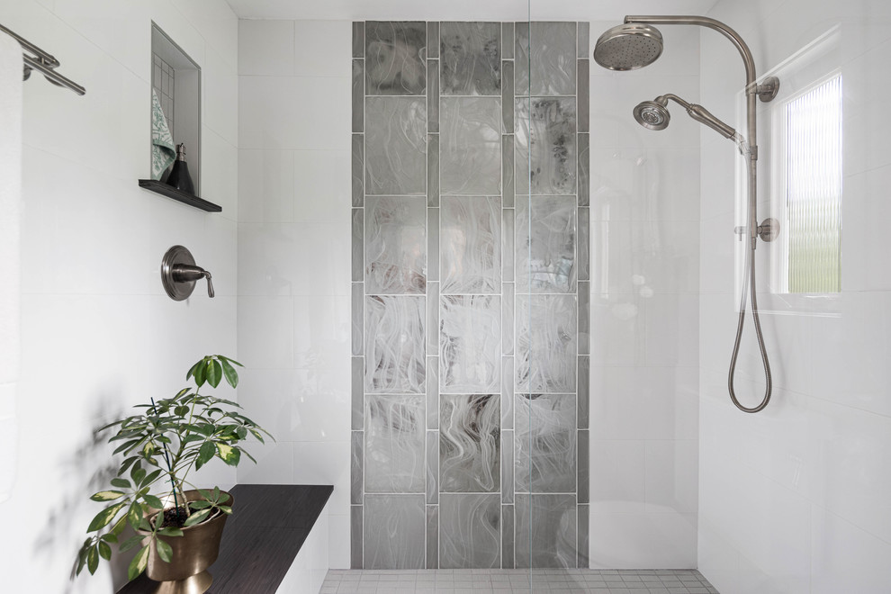 Inspiration for a medium sized classic ensuite bathroom in Seattle with dark wood cabinets, an alcove shower, white tiles, glass tiles, white walls, porcelain flooring, a submerged sink, grey floors, an open shower and grey worktops.