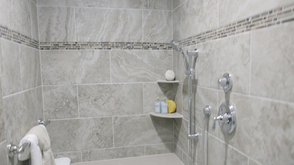 Example of a mid-sized classic master gray tile and ceramic tile ceramic tile bathroom design in Chicago with raised-panel cabinets, white cabinets, a wall-mount toilet, an undermount sink, granite countertops and beige walls