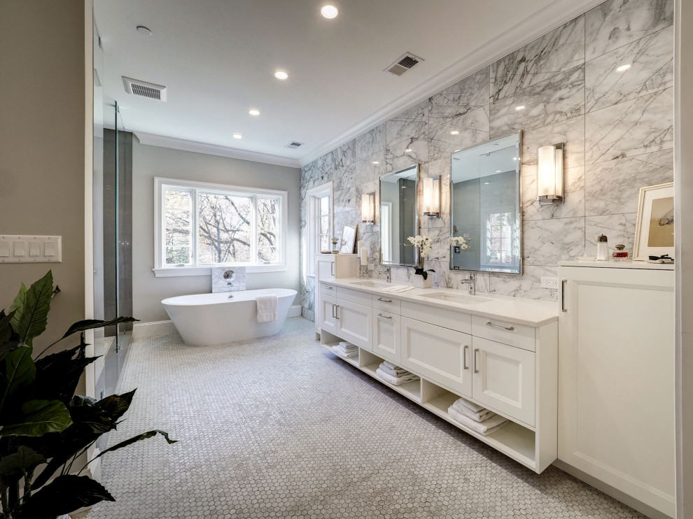 Bathroom - huge transitional master gray tile and porcelain tile gray floor bathroom idea in DC Metro with shaker cabinets, white cabinets, gray walls, an undermount sink, a hinged shower door and white countertops