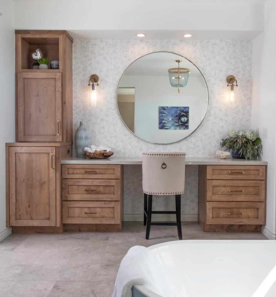 Large nautical ensuite bathroom in Denver with recessed-panel cabinets, distressed cabinets, a freestanding bath, a walk-in shower, a two-piece toilet, white tiles, white walls, limestone flooring, a submerged sink, quartz worktops, grey floors, a hinged door and grey worktops.