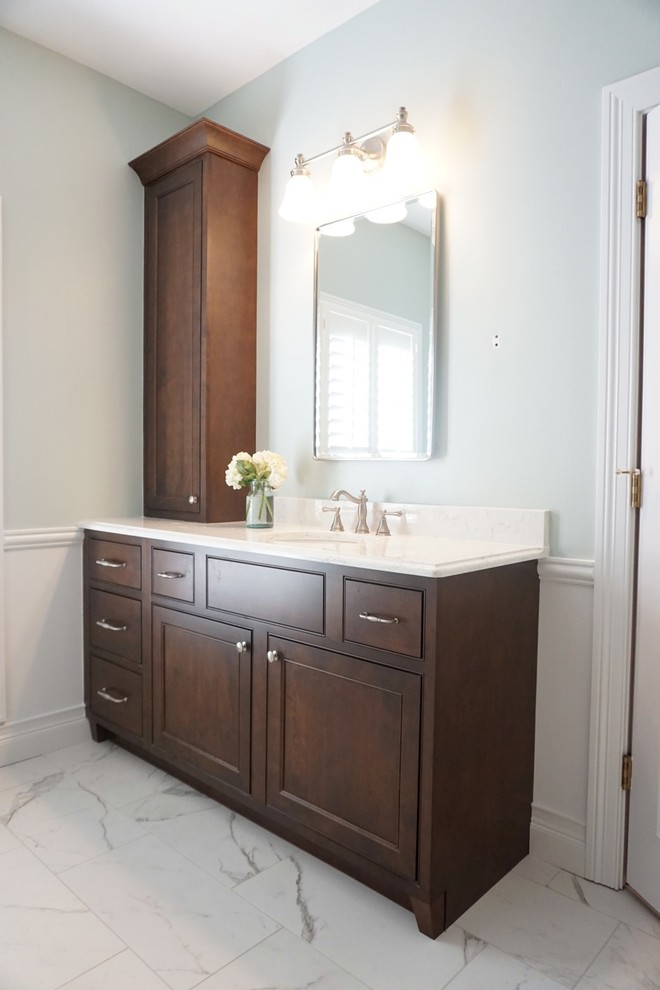 Large elegant master white tile and subway tile porcelain tile bathroom photo in St Louis with an undermount sink, beaded inset cabinets, dark wood cabinets, quartzite countertops and green walls
