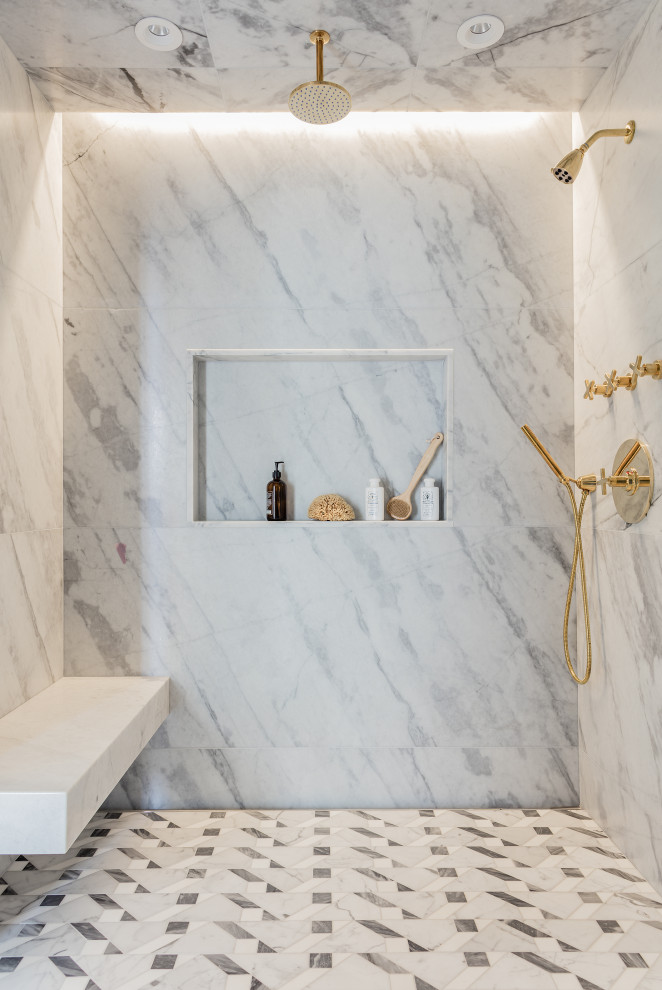 Mid-sized transitional master marble tile marble floor alcove shower photo in Boston with flat-panel cabinets, blue cabinets, a one-piece toilet, white walls, an undermount sink, quartzite countertops, a hinged shower door and white countertops