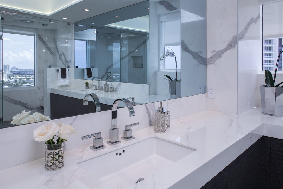 Design ideas for a medium sized contemporary ensuite bathroom in Miami with freestanding cabinets, grey cabinets, a double shower, white tiles, porcelain tiles, porcelain flooring, a submerged sink, tiled worktops, grey floors, a hinged door and white worktops.