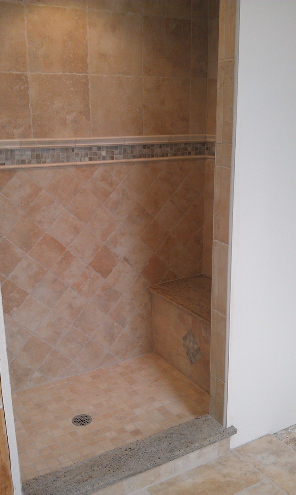 Photo of a medium sized modern ensuite bathroom in Detroit with an alcove shower, beige tiles, ceramic tiles and ceramic flooring.