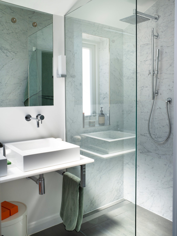 Small contemporary shower room bathroom in London with a walk-in shower, a one-piece toilet, black and white tiles, marble tiles, grey walls, ceramic flooring, a console sink, tiled worktops, grey floors, an open shower, white worktops, a wall niche, double sinks and a floating vanity unit.