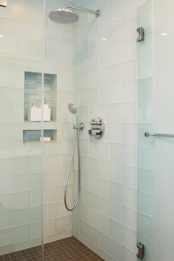 Medium sized contemporary shower room bathroom in Los Angeles with flat-panel cabinets, white cabinets, solid surface worktops, a corner shower, a one-piece toilet, glass tiles, grey walls and porcelain flooring.