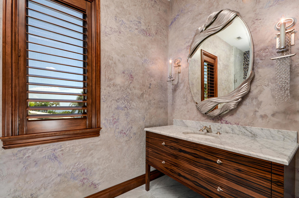 Inspiration pour une salle de bain design en bois brun de taille moyenne avec un placard en trompe-l'oeil, un mur violet, un sol en marbre, un lavabo encastré, un plan de toilette en marbre, un carrelage multicolore, mosaïque et WC à poser.