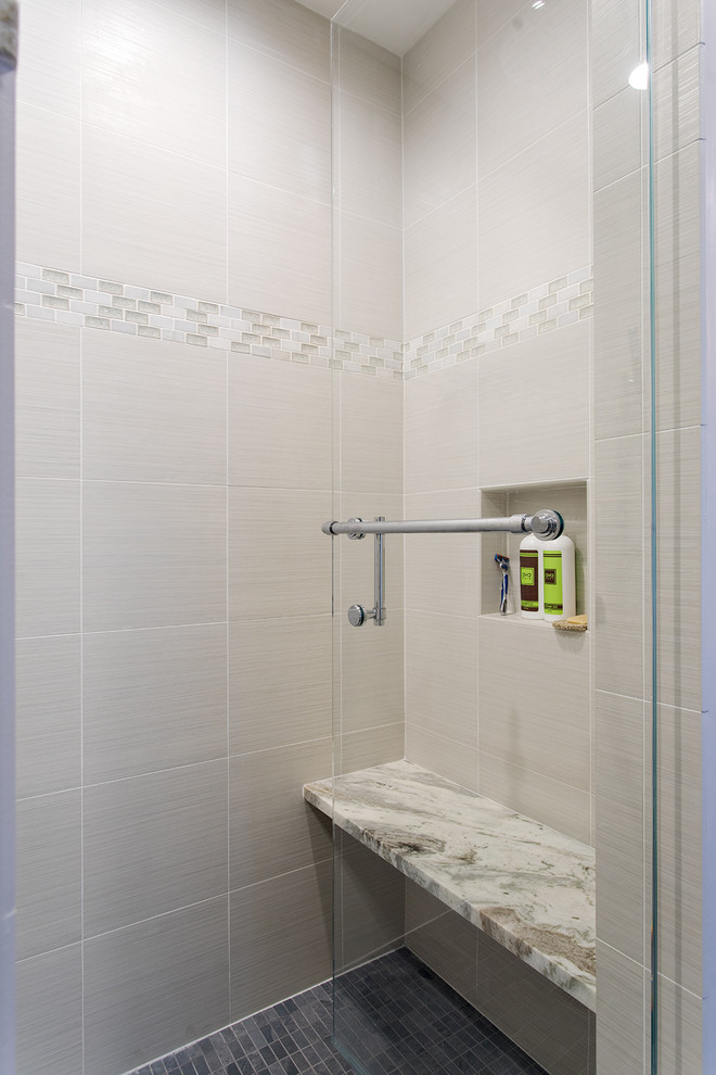 Inspiration for a mid-sized contemporary master beige tile and stone slab slate floor alcove shower remodel in Boston with an undermount sink, light wood cabinets, beige walls, granite countertops and raised-panel cabinets