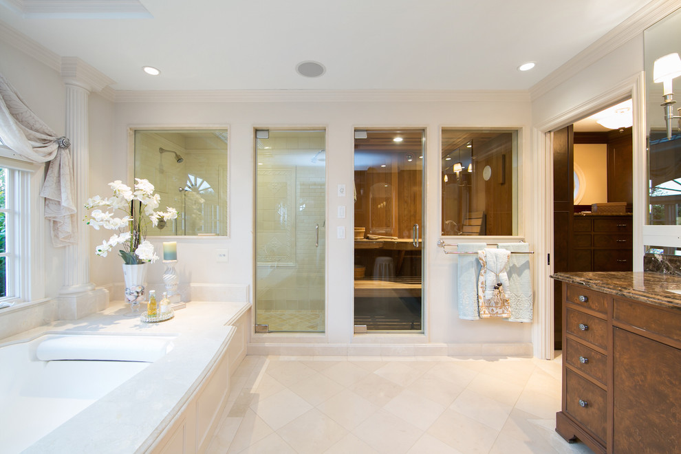 На фото: большая главная ванная комната в классическом стиле с полновстраиваемой ванной, душем в нише, плоскими фасадами и фасадами цвета дерева среднего тона с