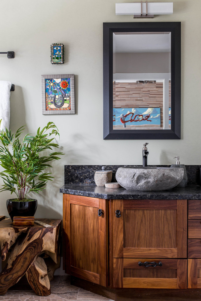 Large contemporary ensuite bathroom in Austin with shaker cabinets, medium wood cabinets, marble flooring, a vessel sink, granite worktops, beige floors, black worktops and grey walls.