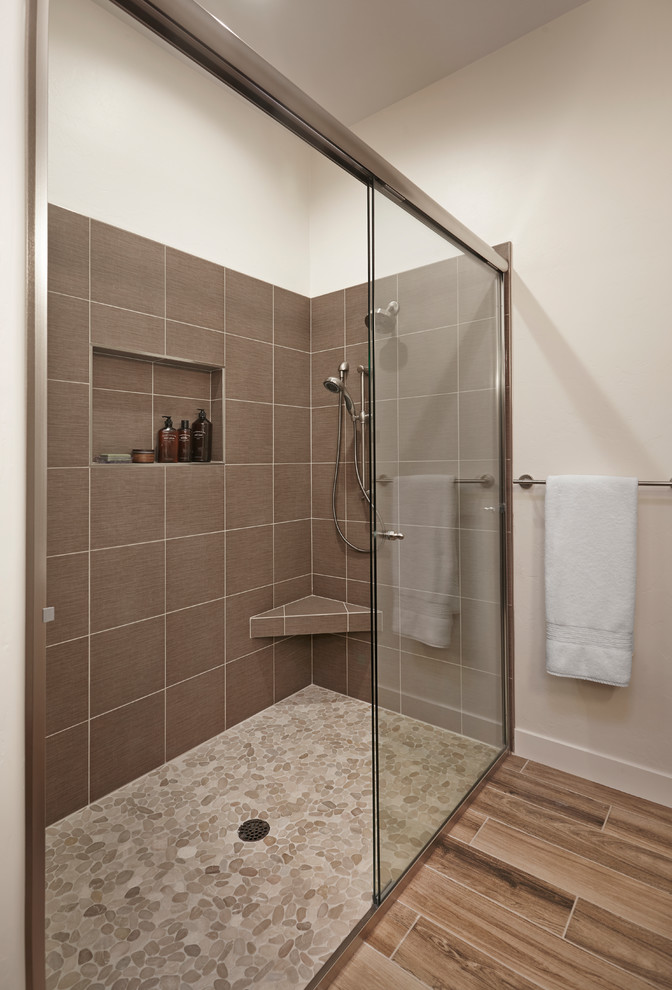 Medium sized classic bathroom in Phoenix with a built-in shower, a one-piece toilet, pebble tiles and a submerged sink.