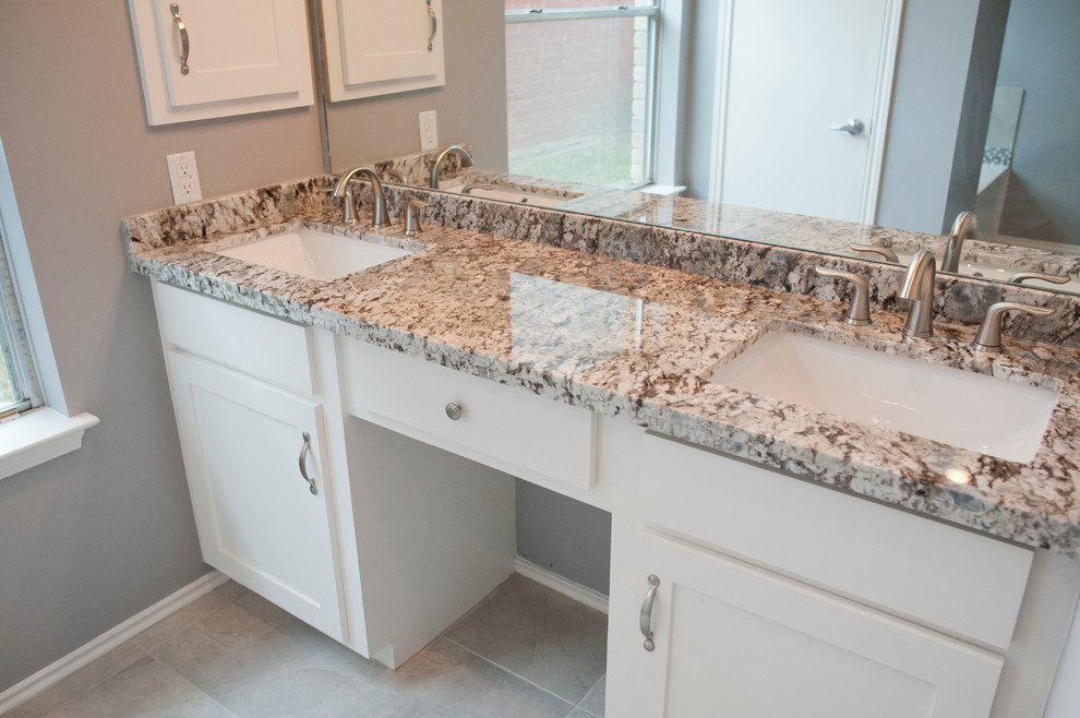 This is an example of a medium sized classic bathroom in Houston with a submerged sink, recessed-panel cabinets, granite worktops, grey tiles, ceramic tiles, grey walls and ceramic flooring.