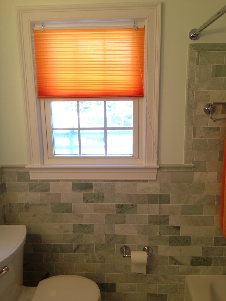 Example of a mid-sized southwest master gray tile and subway tile mosaic tile floor and gray floor bathroom design in Boston with flat-panel cabinets, white cabinets, a two-piece toilet, blue walls, an undermount sink and quartz countertops