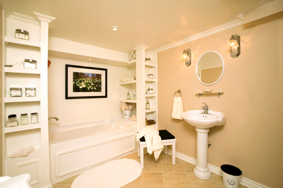 Design ideas for a medium sized classic ensuite bathroom in Dallas with freestanding cabinets, white cabinets, an alcove bath, a one-piece toilet, beige tiles, porcelain tiles, beige walls, porcelain flooring, a pedestal sink, a shower/bath combination, beige floors and an open shower.