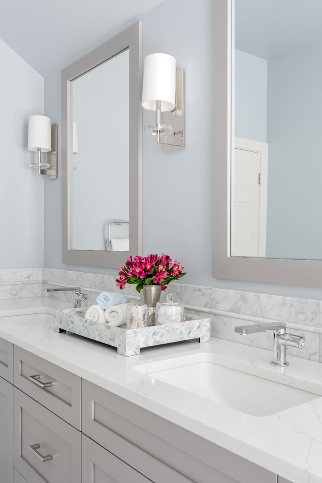 Medium sized traditional ensuite bathroom in Seattle with shaker cabinets, grey cabinets, a freestanding bath, a walk-in shower, a two-piece toilet, white tiles, marble tiles, grey walls, marble flooring, a submerged sink, engineered stone worktops, white floors, an open shower and white worktops.