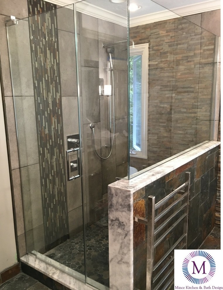 Medium sized classic ensuite bathroom in Indianapolis with freestanding cabinets, dark wood cabinets, a freestanding bath, a double shower, a bidet, multi-coloured tiles, stone tiles, grey walls, slate flooring, a vessel sink and marble worktops.