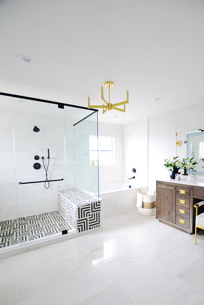 Inspiration for a large modern ensuite bathroom in Other with freestanding cabinets, medium wood cabinets, a built-in bath, a double shower, a one-piece toilet, white tiles, porcelain tiles, white walls, porcelain flooring, a console sink, marble worktops, white floors, a sliding door and white worktops.