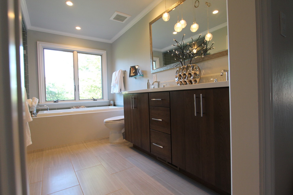 Mid-sized trendy green tile and glass tile porcelain tile bathroom photo in San Francisco with an undermount sink, flat-panel cabinets, dark wood cabinets, quartz countertops, a two-piece toilet and gray walls