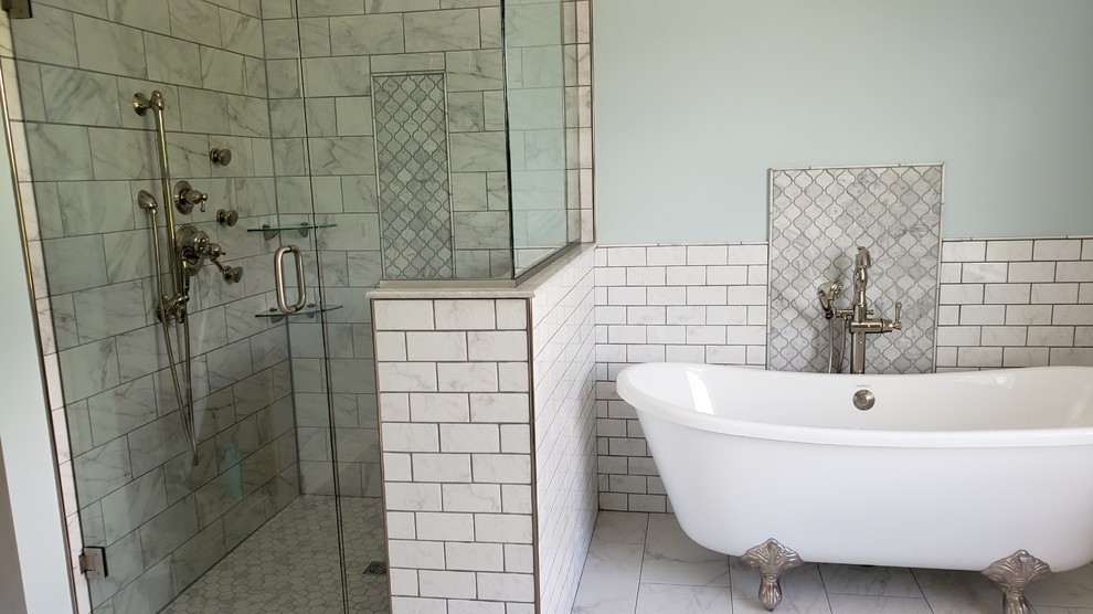 Mid-sized minimalist master multicolored tile and porcelain tile porcelain tile and multicolored floor bathroom photo in Boston with shaker cabinets, white cabinets, a two-piece toilet, blue walls, an undermount sink, quartzite countertops, a hinged shower door and multicolored countertops