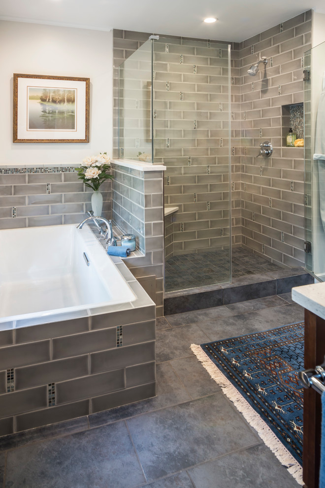 Example of a mid-sized transitional master gray tile and subway tile slate floor bathroom design in Chicago with shaker cabinets, dark wood cabinets, a one-piece toilet, white walls, an undermount sink and quartz countertops