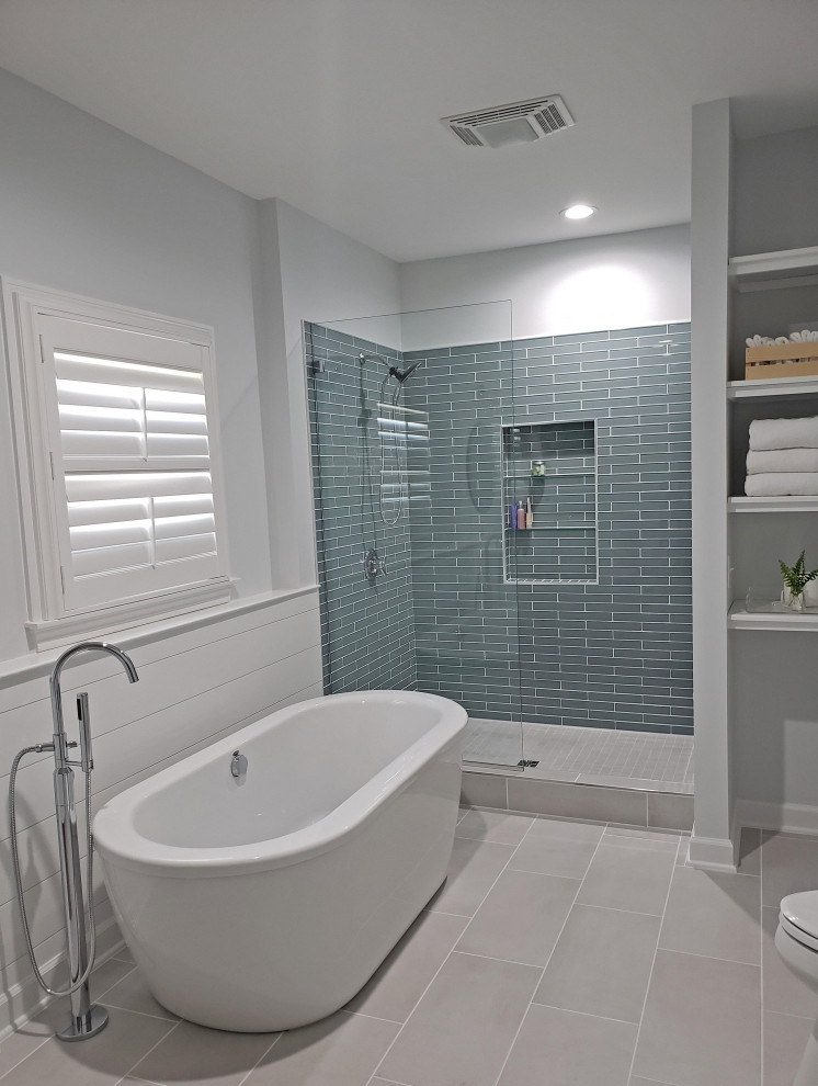 Example of a large trendy master green tile and glass tile porcelain tile, gray floor, double-sink and shiplap wall bathroom design in Nashville with shaker cabinets, white cabinets, white walls, an undermount sink, quartz countertops, white countertops, a niche and a freestanding vanity