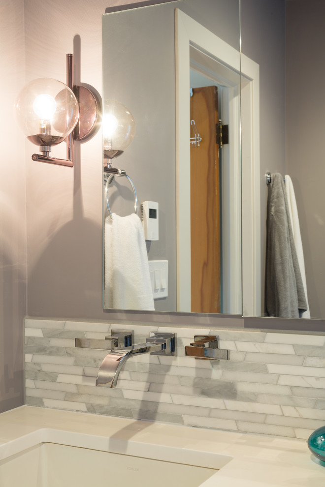 Bathroom - mid-sized transitional master gray tile and ceramic tile porcelain tile bathroom idea in Chicago with flat-panel cabinets, medium tone wood cabinets, a two-piece toilet, gray walls, an undermount sink and quartzite countertops