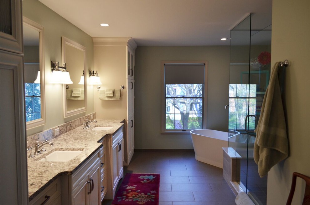 Bathroom - mid-sized traditional master gray tile and stone tile ceramic tile bathroom idea in Chicago with recessed-panel cabinets, white cabinets, an undermount sink, beige walls and granite countertops