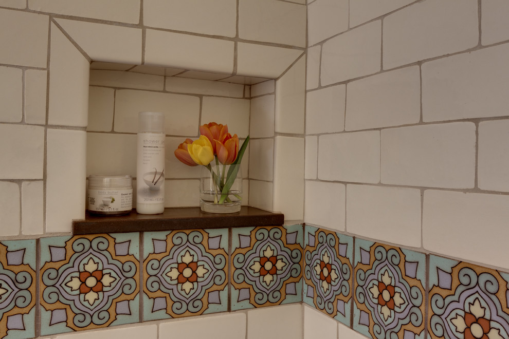 Example of a mid-sized tuscan master multicolored tile and ceramic tile bathroom design in Los Angeles