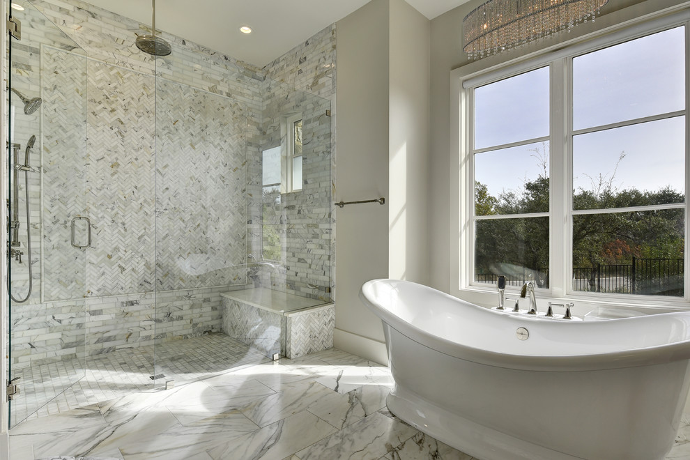Example of a huge transitional master gray tile, white tile and stone tile marble floor and gray floor bathroom design in Austin with shaker cabinets, white cabinets, beige walls, an undermount sink, marble countertops and a hinged shower door