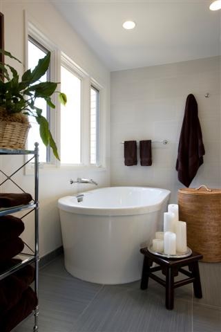 Bathroom - large contemporary multicolored tile and porcelain tile porcelain tile bathroom idea in San Francisco with a vessel sink, flat-panel cabinets, medium tone wood cabinets, quartz countertops, a two-piece toilet and white walls