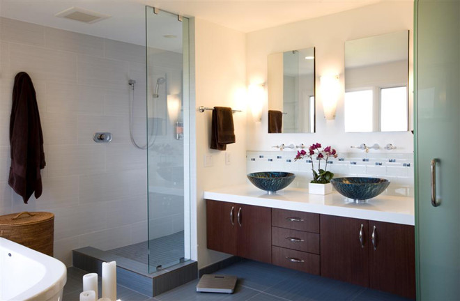 Design ideas for a large contemporary bathroom in San Francisco with a vessel sink, flat-panel cabinets, medium wood cabinets, engineered stone worktops, a freestanding bath, a walk-in shower, a two-piece toilet, multi-coloured tiles, porcelain tiles, white walls and porcelain flooring.