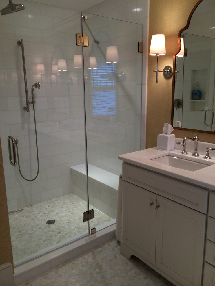 Doorless shower - large coastal master white tile and subway tile marble floor doorless shower idea in Boston with an undermount sink, recessed-panel cabinets, white cabinets, marble countertops, a one-piece toilet and yellow walls