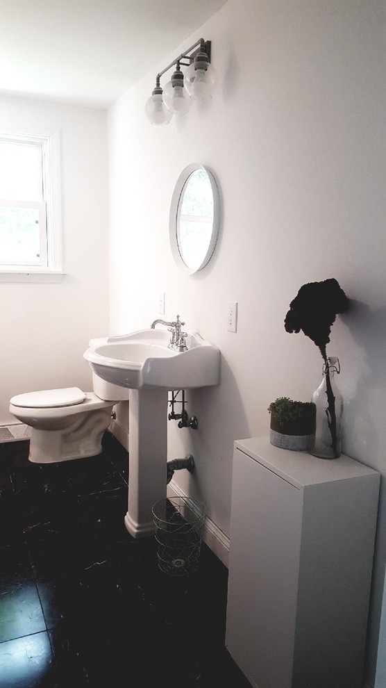 Bathroom - small traditional master black floor bathroom idea in Boston with a two-piece toilet, white walls and a pedestal sink