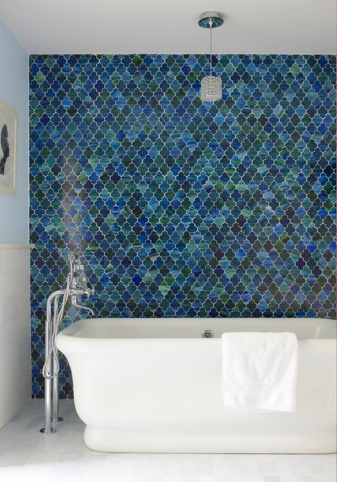 Beach style freestanding bathtub photo in New York