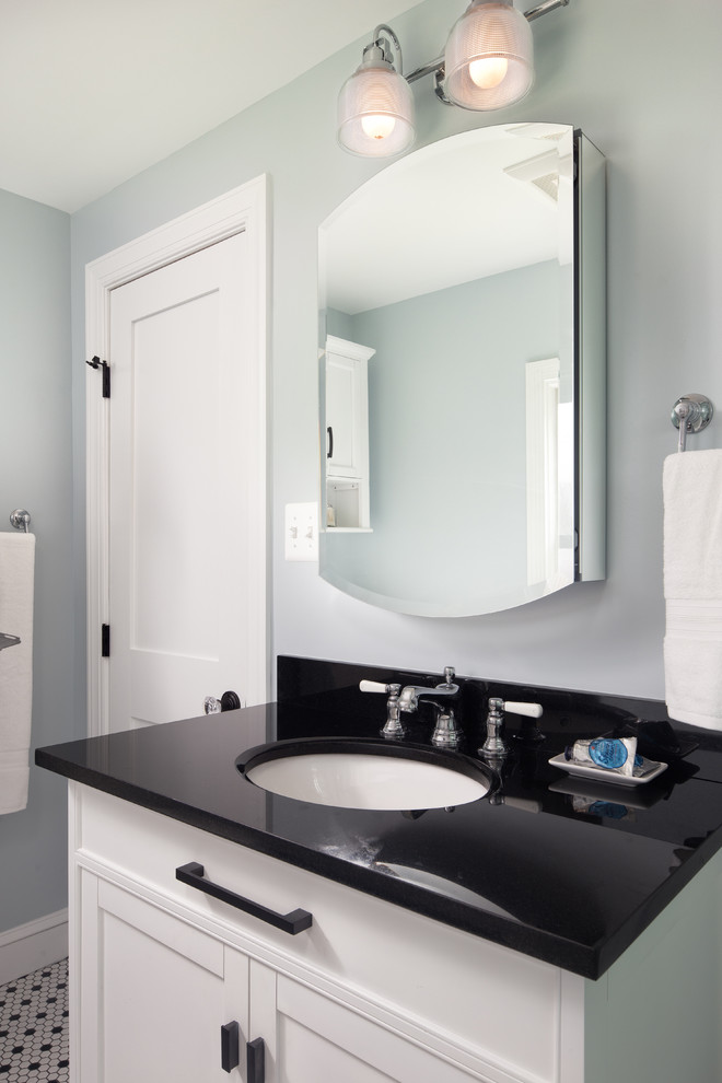 Mid-sized elegant white tile and subway tile ceramic tile bathroom photo in DC Metro with furniture-like cabinets, white cabinets, a two-piece toilet, gray walls, an undermount sink, granite countertops and black countertops
