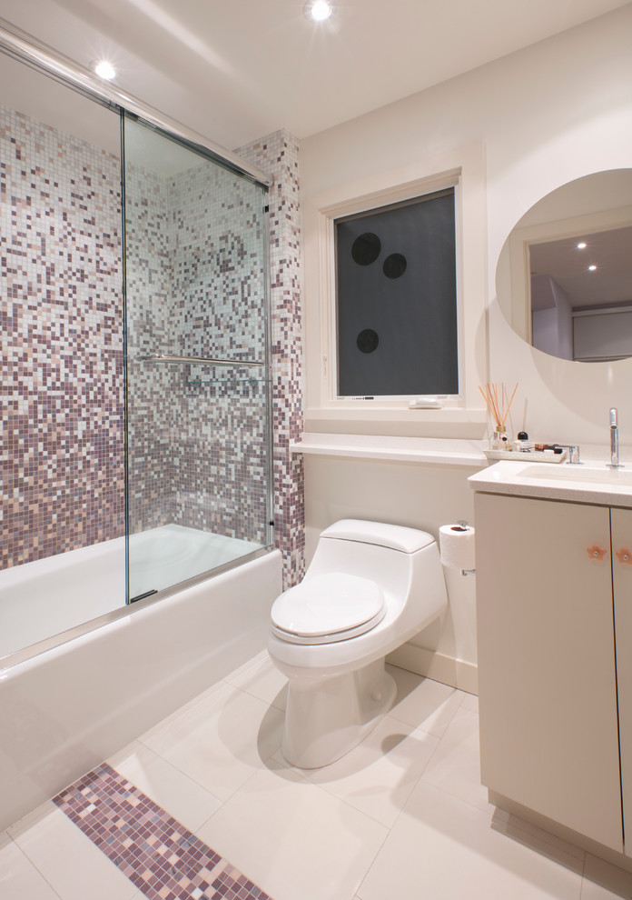 Small trendy kids' multicolored tile and mosaic tile mosaic tile floor bathroom photo in DC Metro with flat-panel cabinets, light wood cabinets, a one-piece toilet, an undermount sink, quartzite countertops and purple walls
