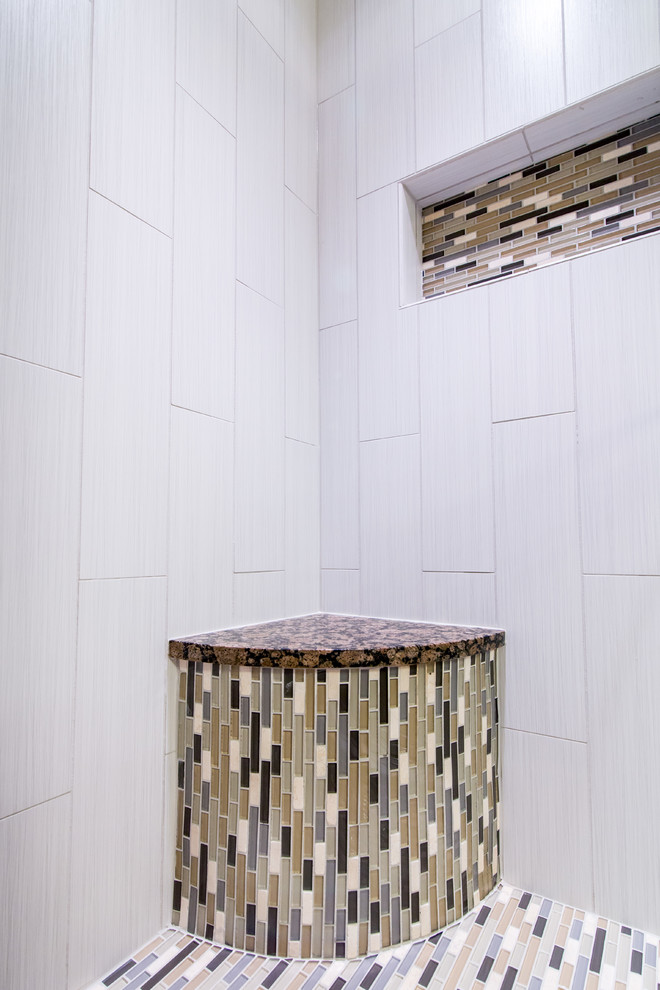 Example of a small transitional master white tile and porcelain tile porcelain tile alcove shower design in DC Metro with recessed-panel cabinets, dark wood cabinets, a two-piece toilet, beige walls, an undermount sink and granite countertops