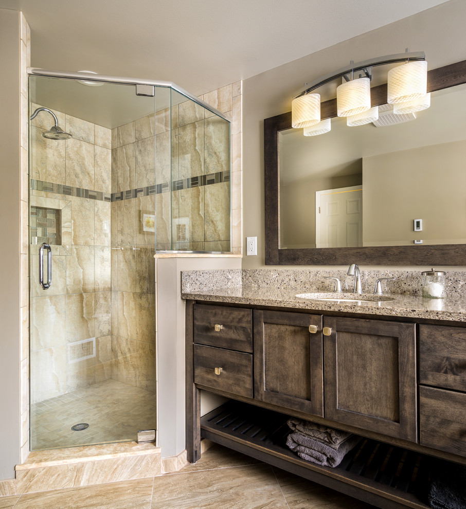 Photo of a medium sized classic ensuite bathroom in Detroit with a submerged sink, shaker cabinets, grey cabinets, engineered stone worktops, a freestanding bath, an alcove shower, a two-piece toilet, grey tiles, porcelain tiles, grey walls, porcelain flooring, beige floors and a hinged door.