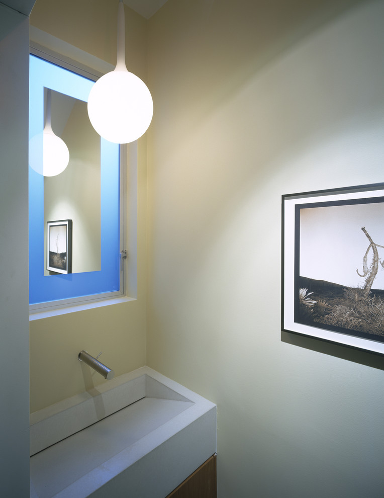 This is an example of a modern bathroom in San Francisco with an integrated sink.